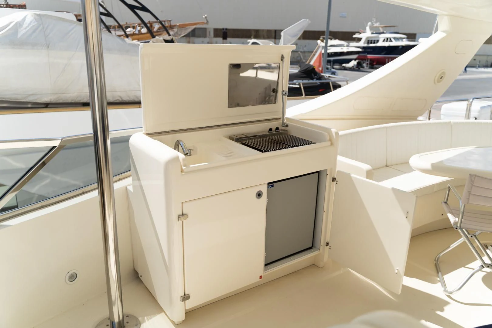 a white machine on a boat aboard ALPINN Yacht for Sale