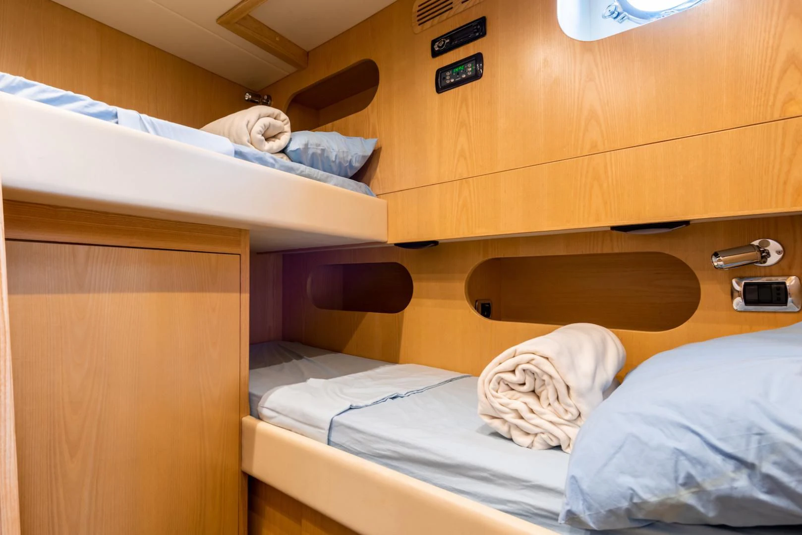 a couple of beds in a room aboard ALPINN Yacht for Sale