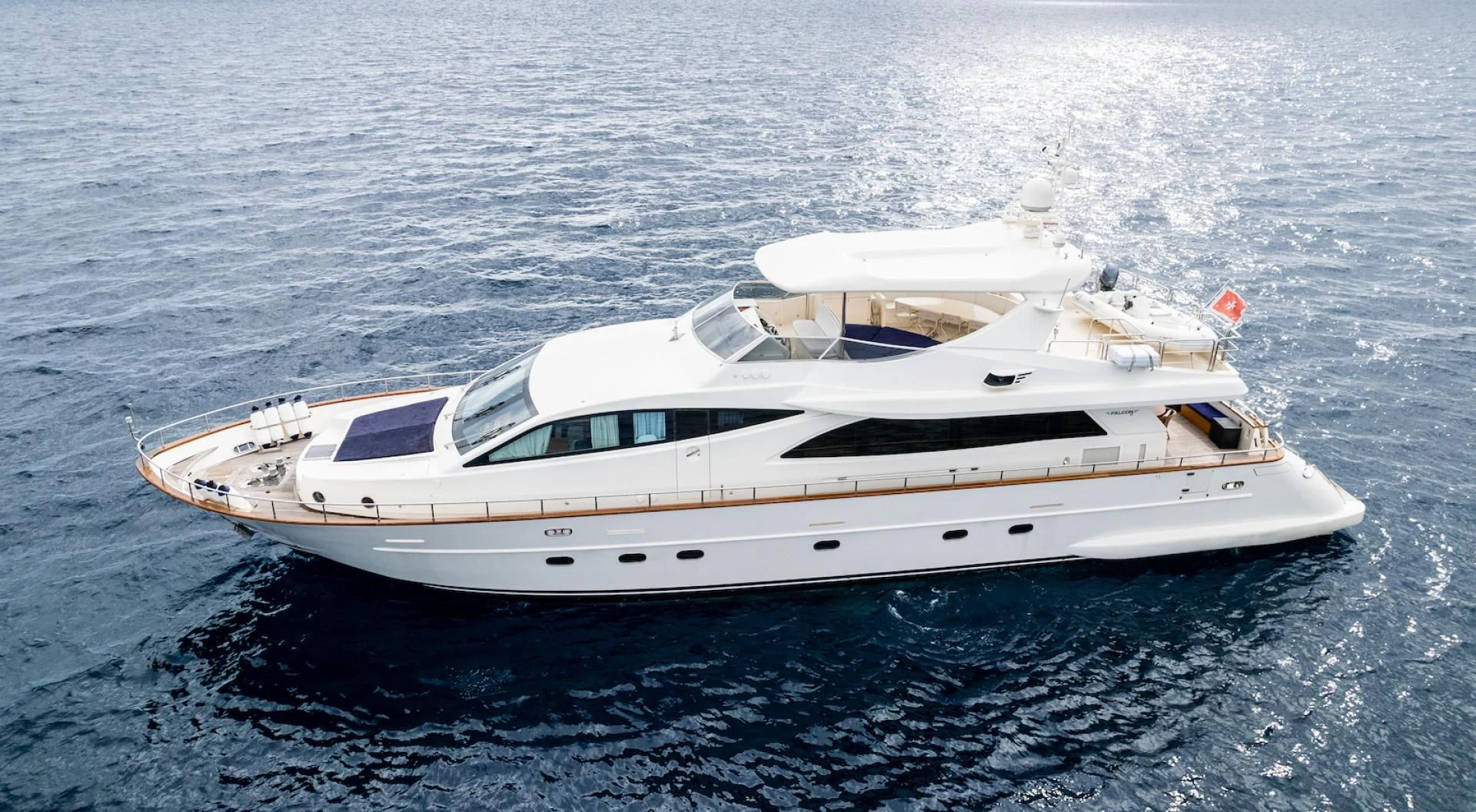 a white yacht in the water aboard ALPINN Yacht for Sale