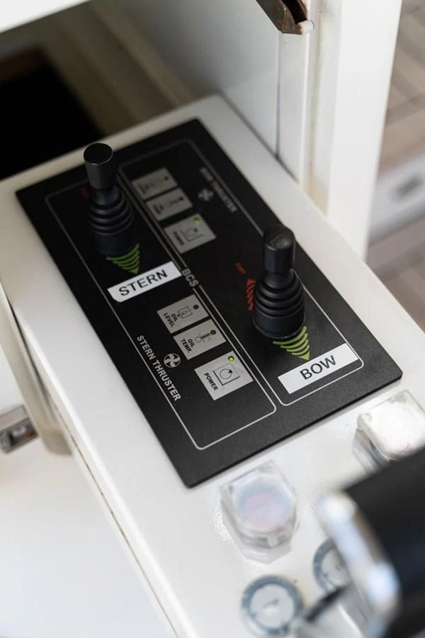 a black electronic device aboard ALPINN Yacht for Sale