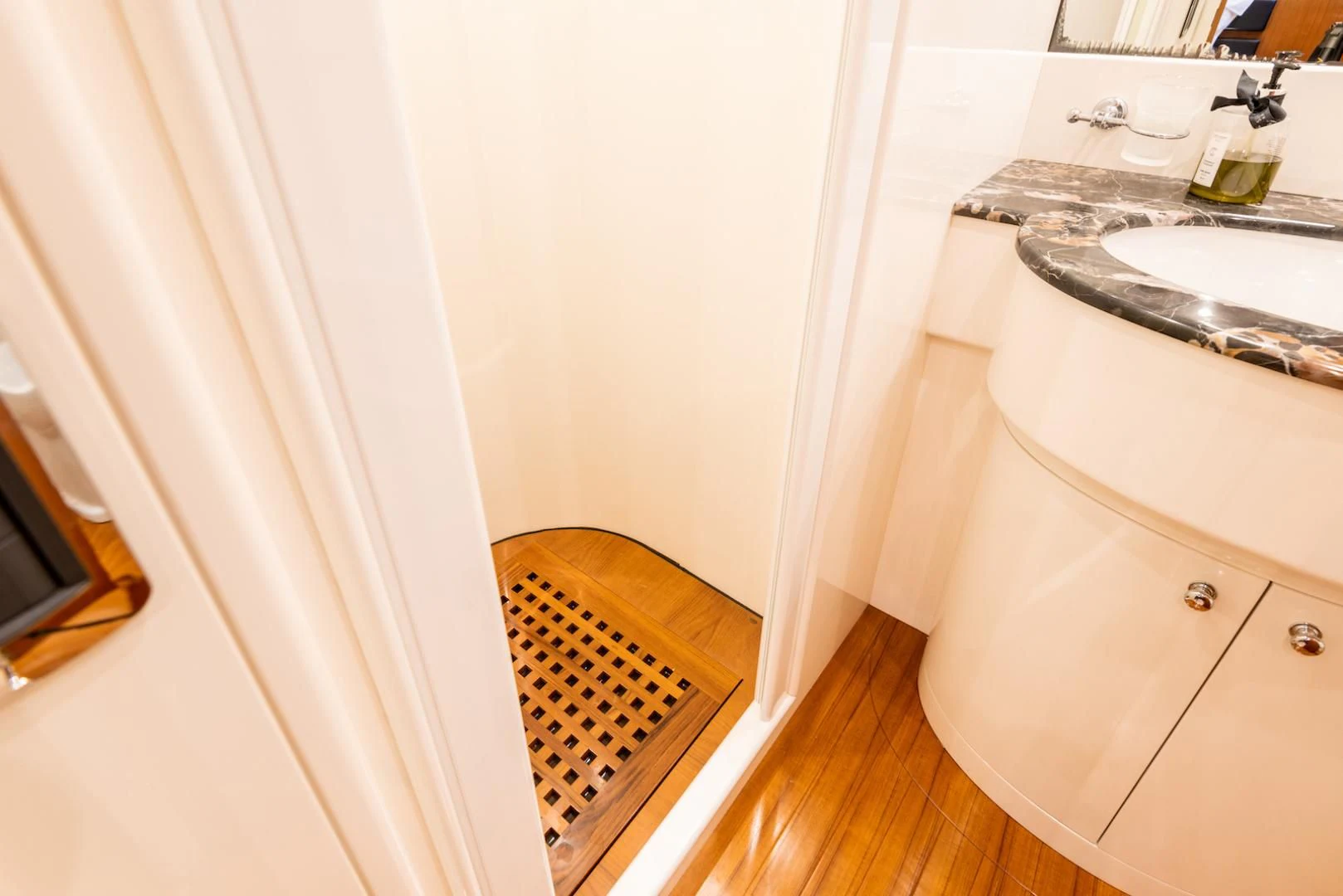 a bathroom with a sink and a mirror aboard ALPINN Yacht for Sale