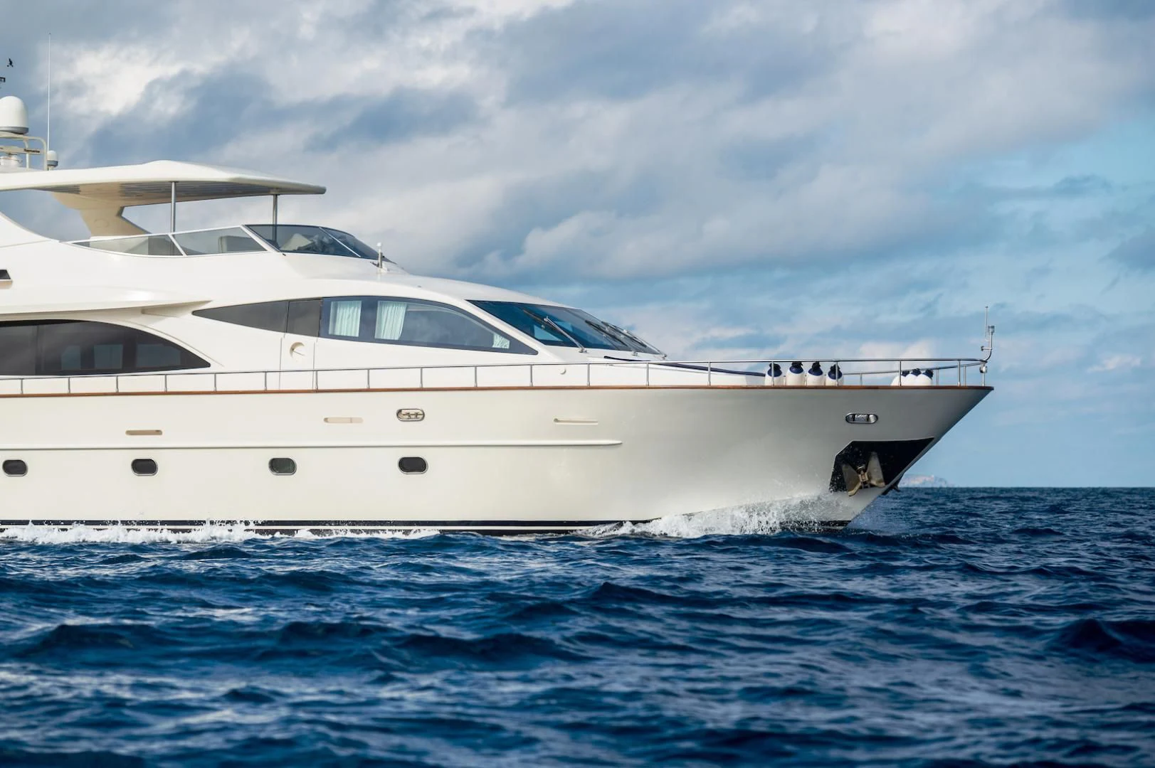 a white yacht in the water aboard ALPINN Yacht for Sale