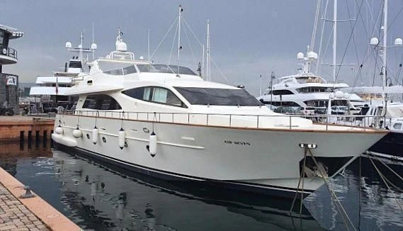 a white yacht docked aboard ALPINN Yacht for Sale