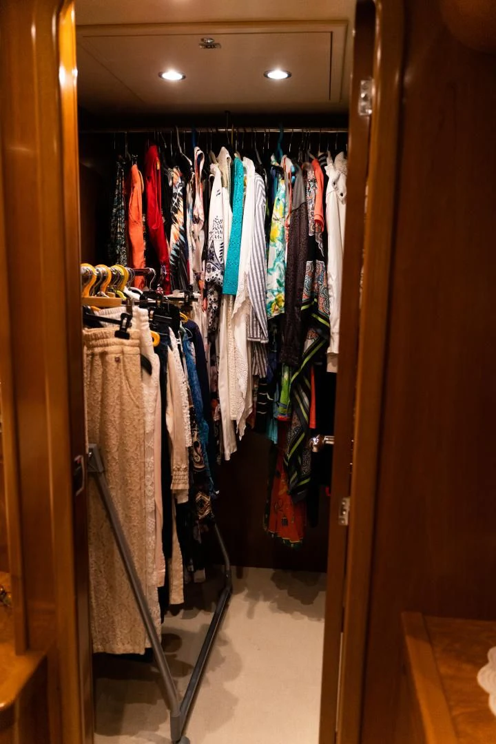 a closet full of clothes aboard ALPINN Yacht for Sale