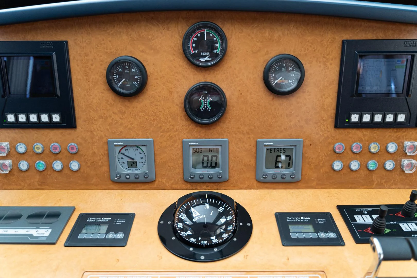 a table with various electronics aboard ALPINN Yacht for Sale