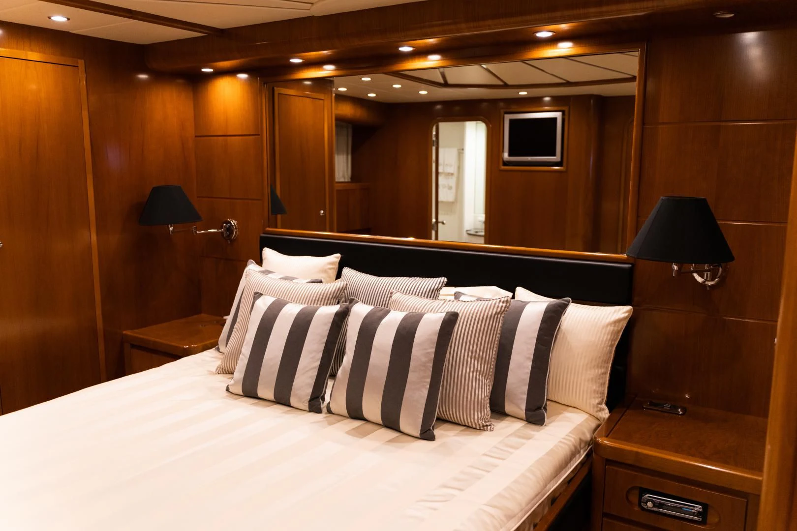 a bed with pillows aboard ALPINN Yacht for Sale