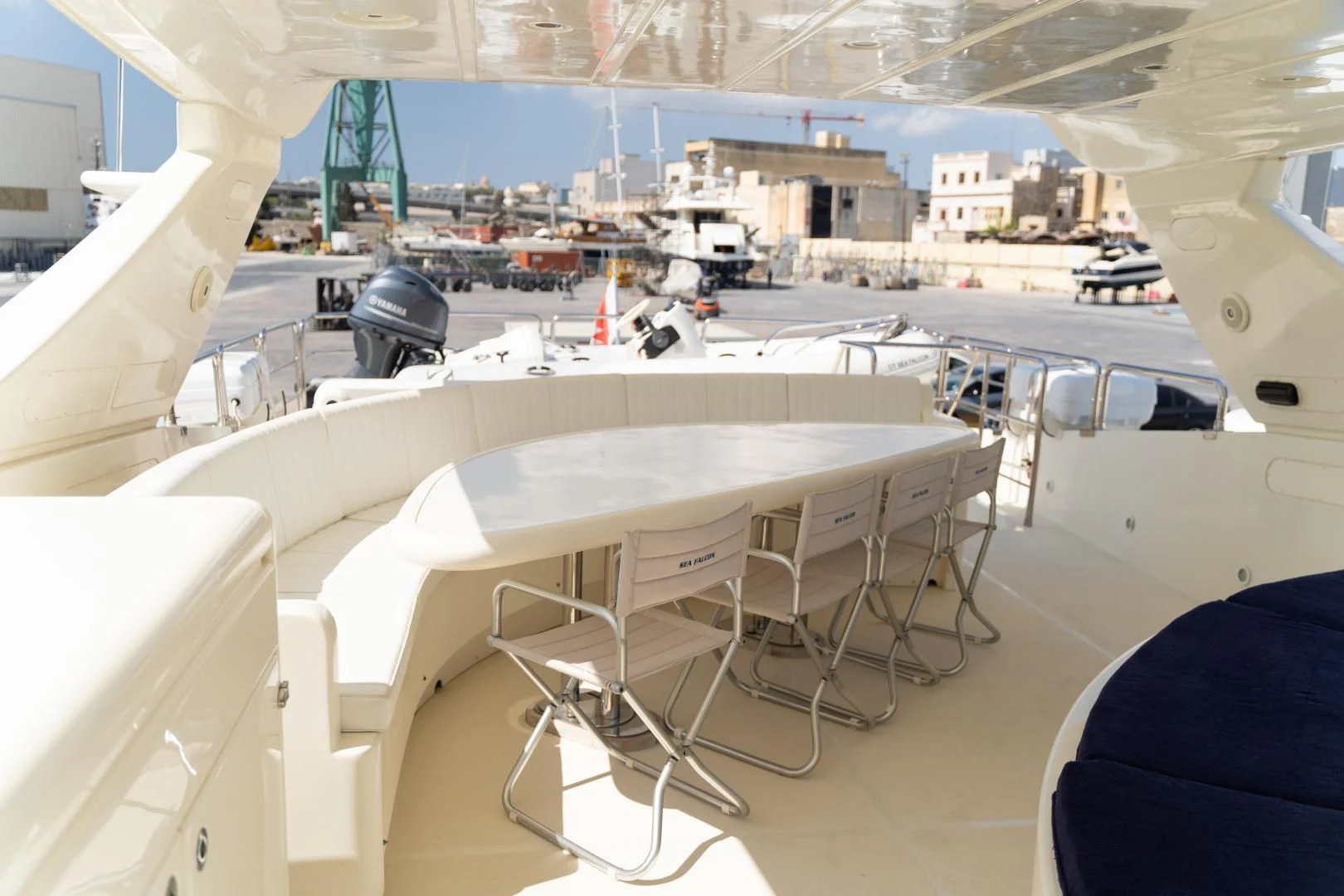 a room with tables and chairs aboard ALPINN Yacht for Sale
