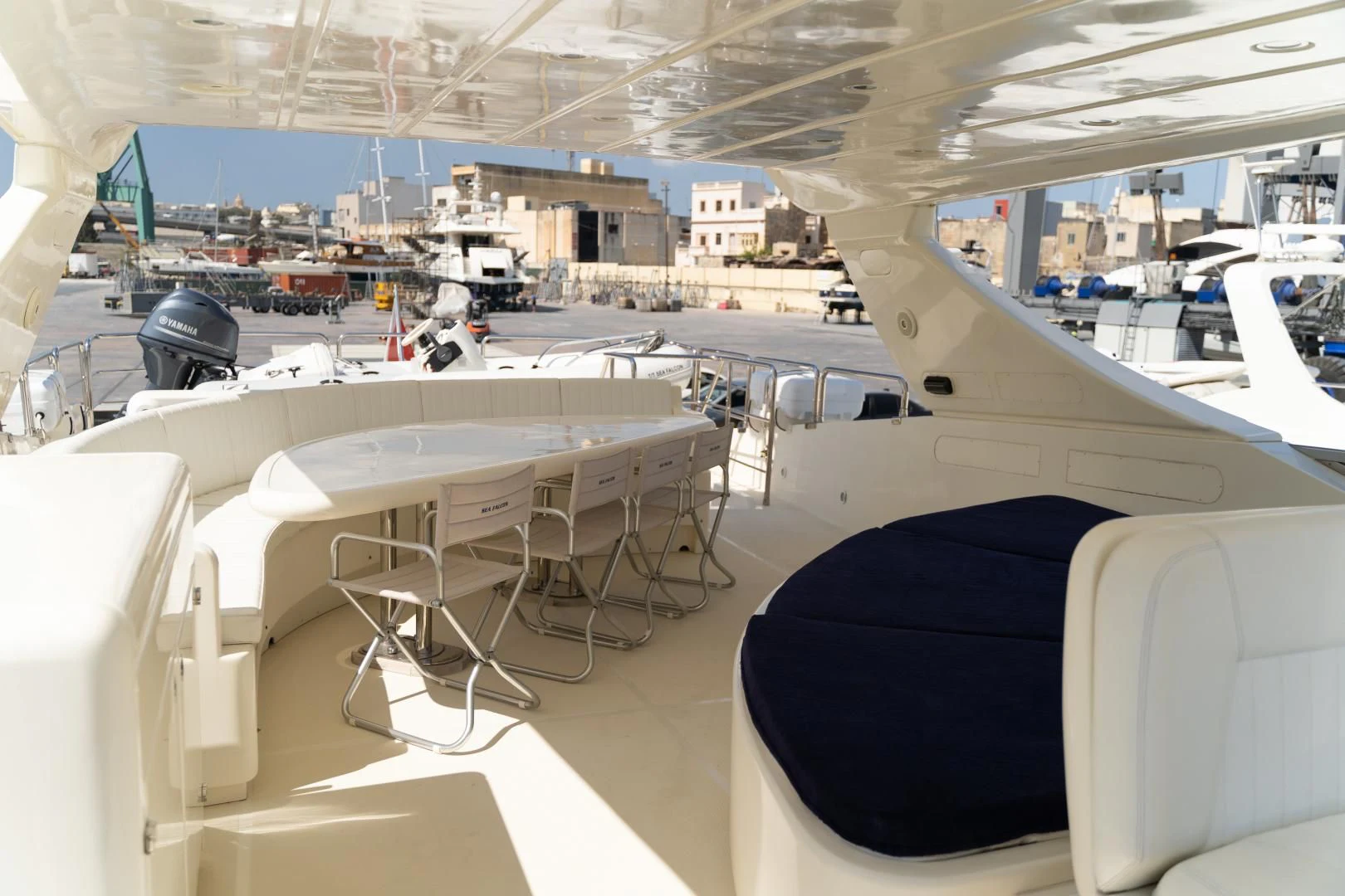 a room with tables and chairs aboard ALPINN Yacht for Sale
