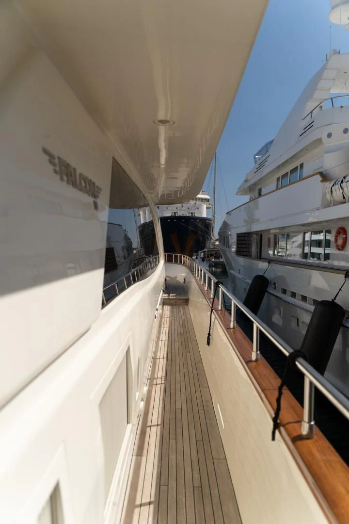 a wooden walkway between buildings aboard ALPINN Yacht for Sale