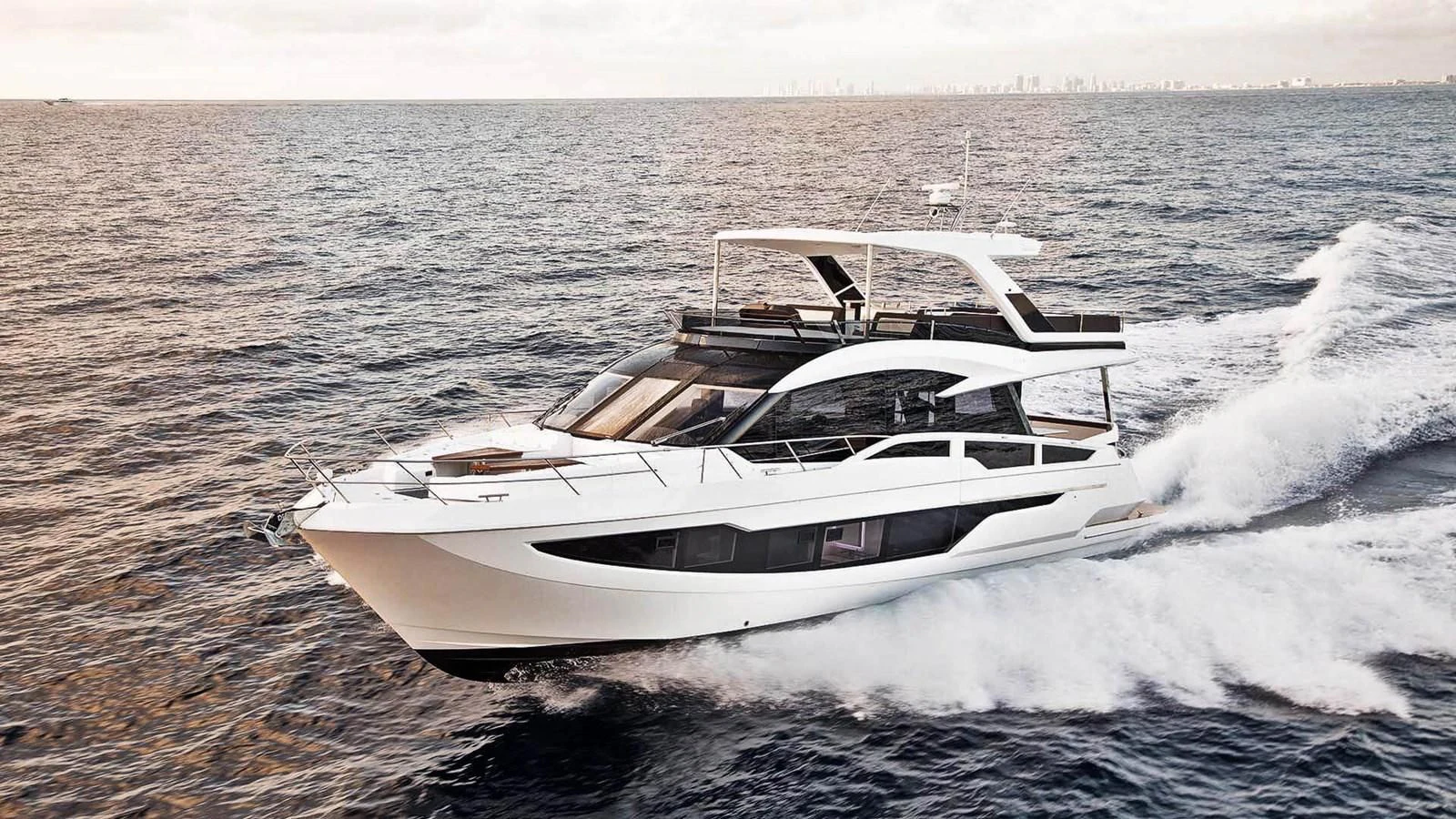 a white yacht on the water aboard GALEON 640 Yacht for Sale