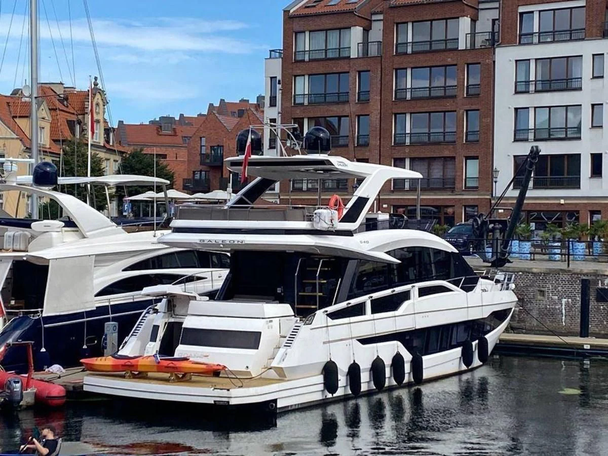 boats docked in a harbor aboard GALEON 640 Yacht for Sale