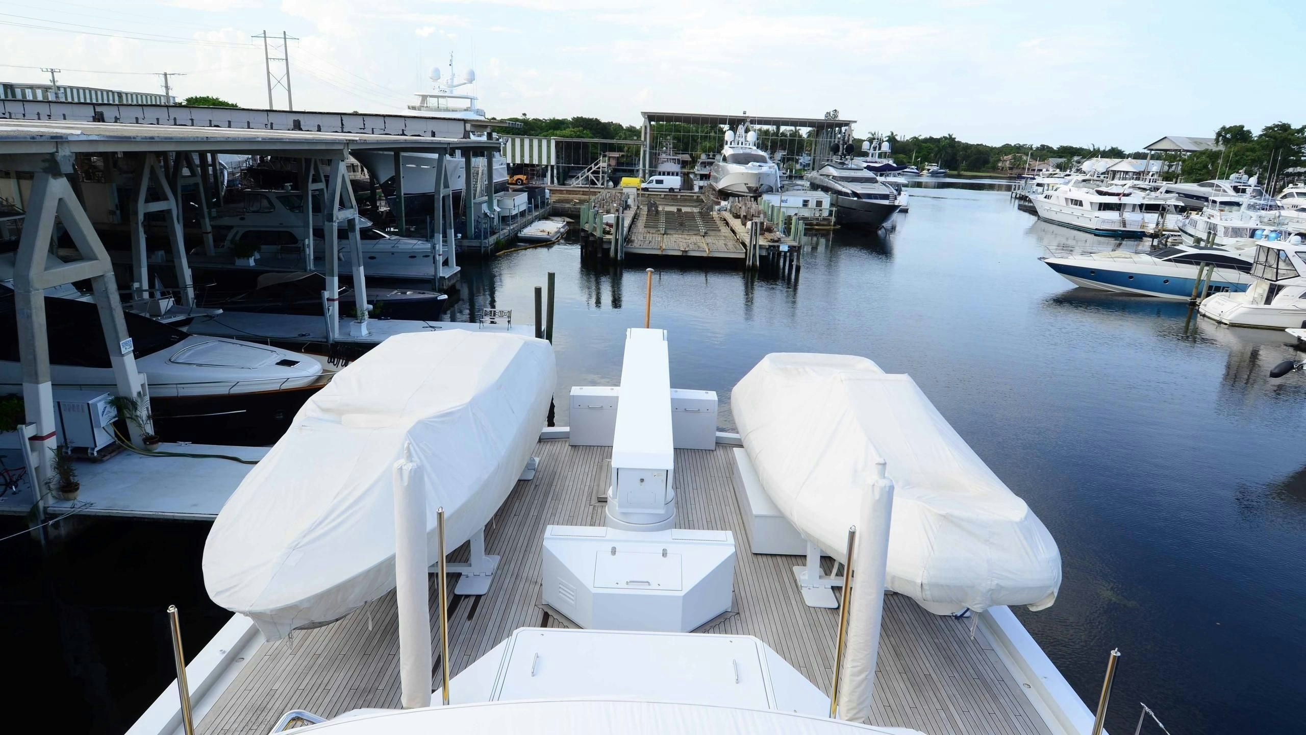 a dock with boats on it aboard KORU Yacht for Charter