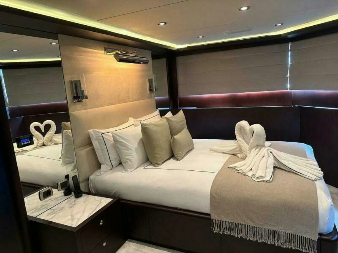 a bed in a room aboard KORU Yacht for Charter