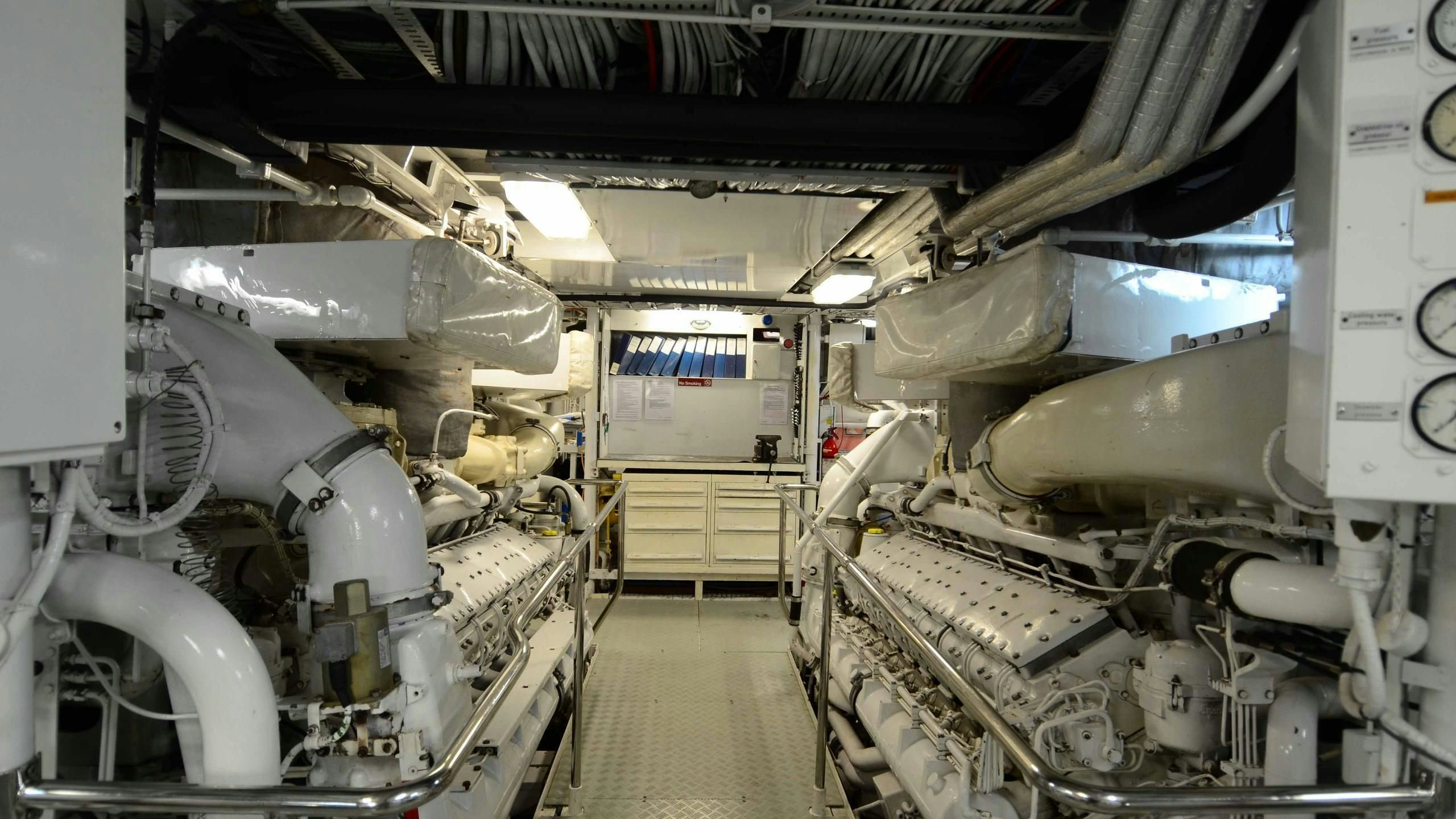 a large room with machinery aboard KORU Yacht for Charter