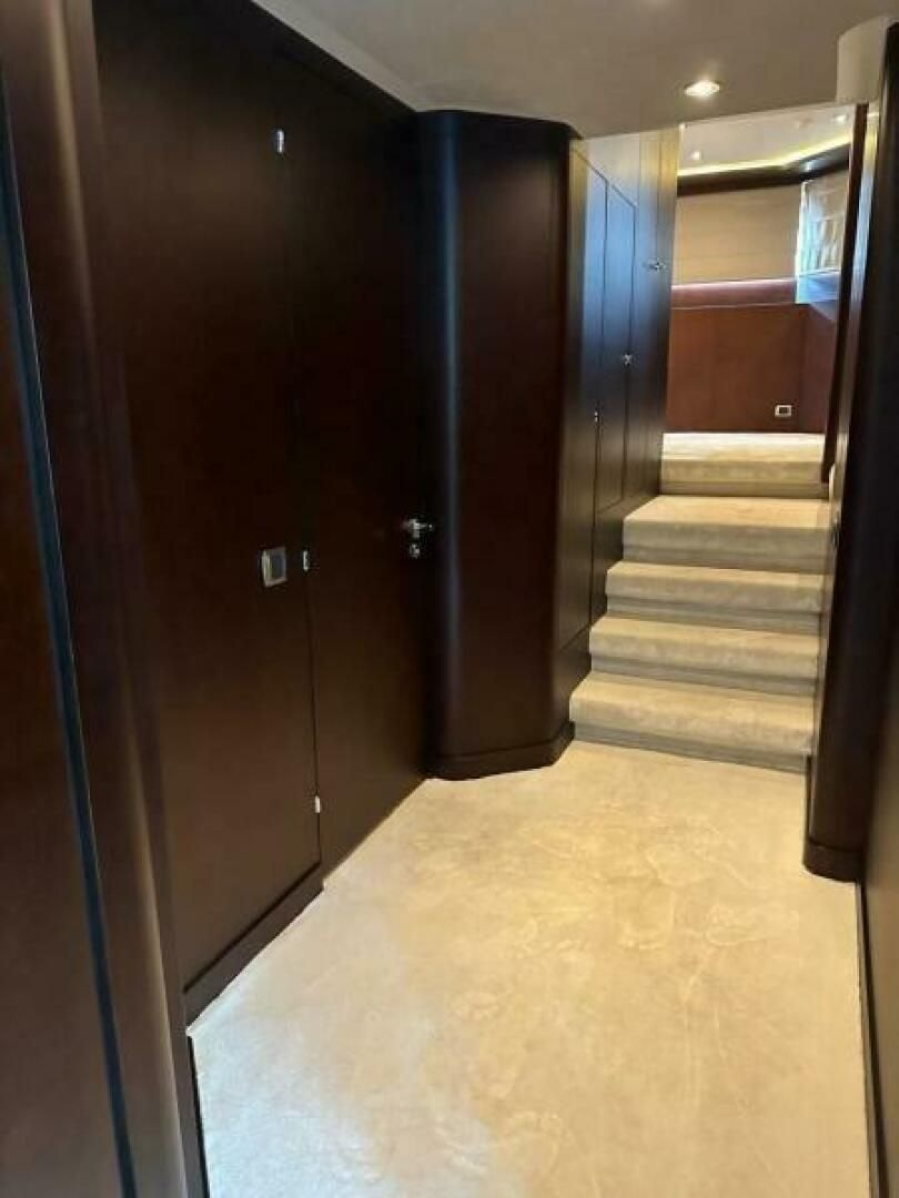 a hallway with doors aboard KORU Yacht for Charter