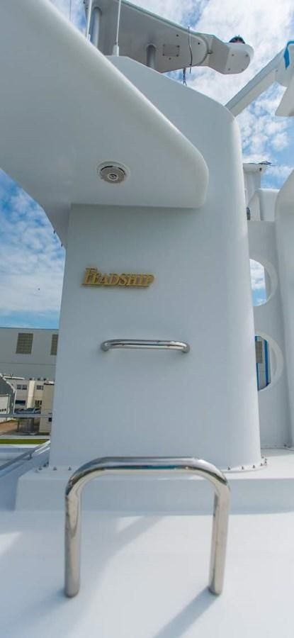 a white machine with a metal handle aboard KORU Yacht for Charter