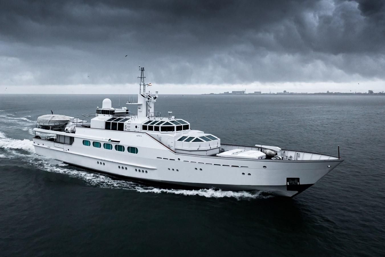 a white boat in the water aboard KORU Yacht for Charter