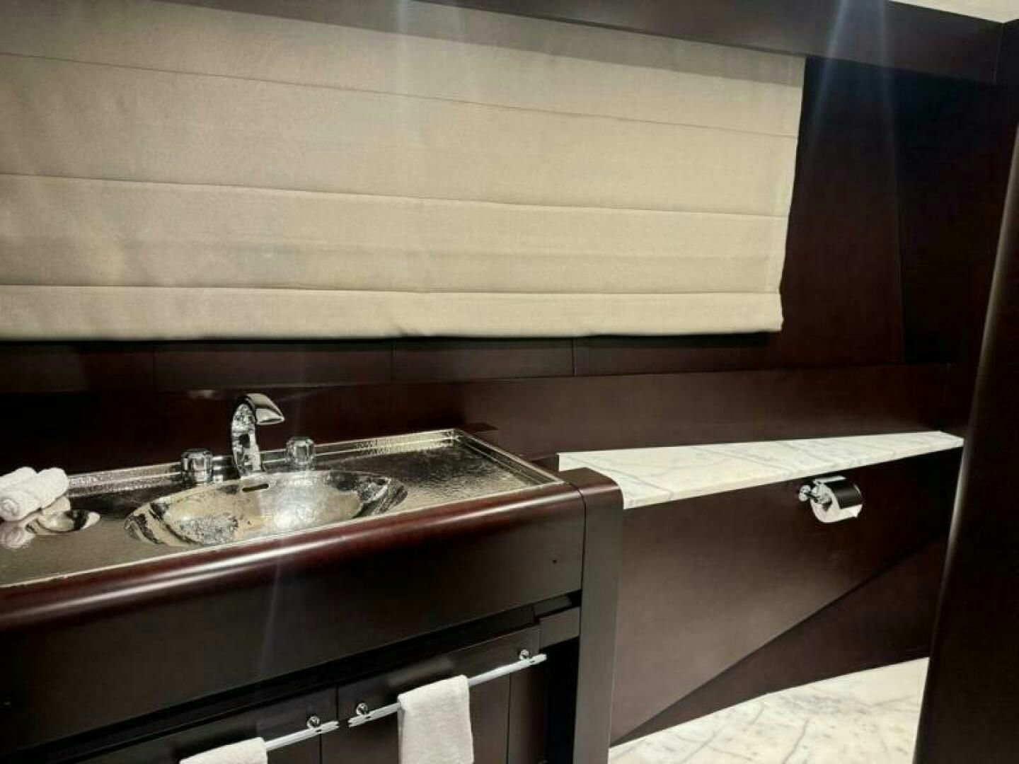 a sink in a bathroom aboard KORU Yacht for Charter
