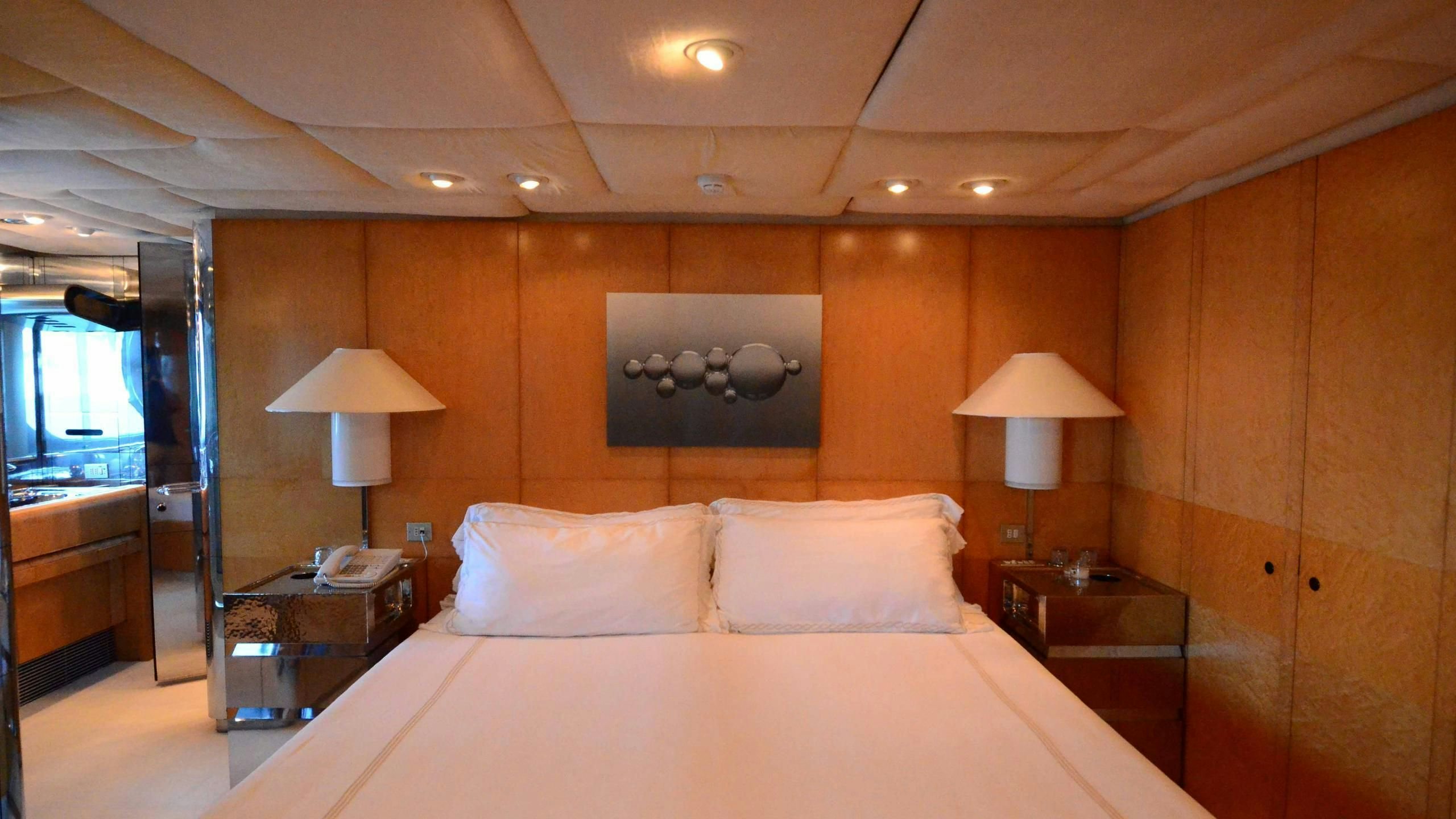 a bed in a room aboard KORU Yacht for Charter
