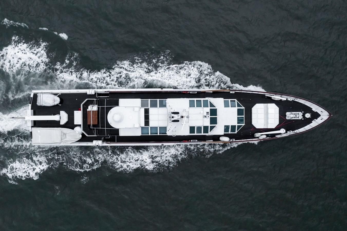 a black and white boat with white writing on it aboard KORU Yacht for Charter