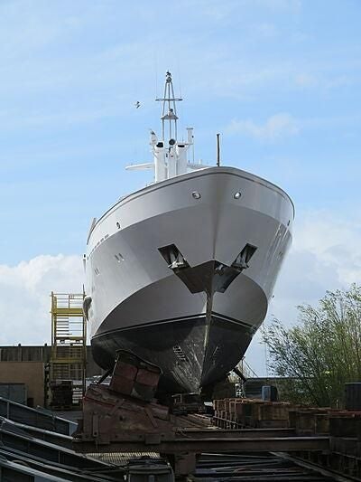 a large white cylindrical object with a bird on it aboard KORU Yacht for Charter