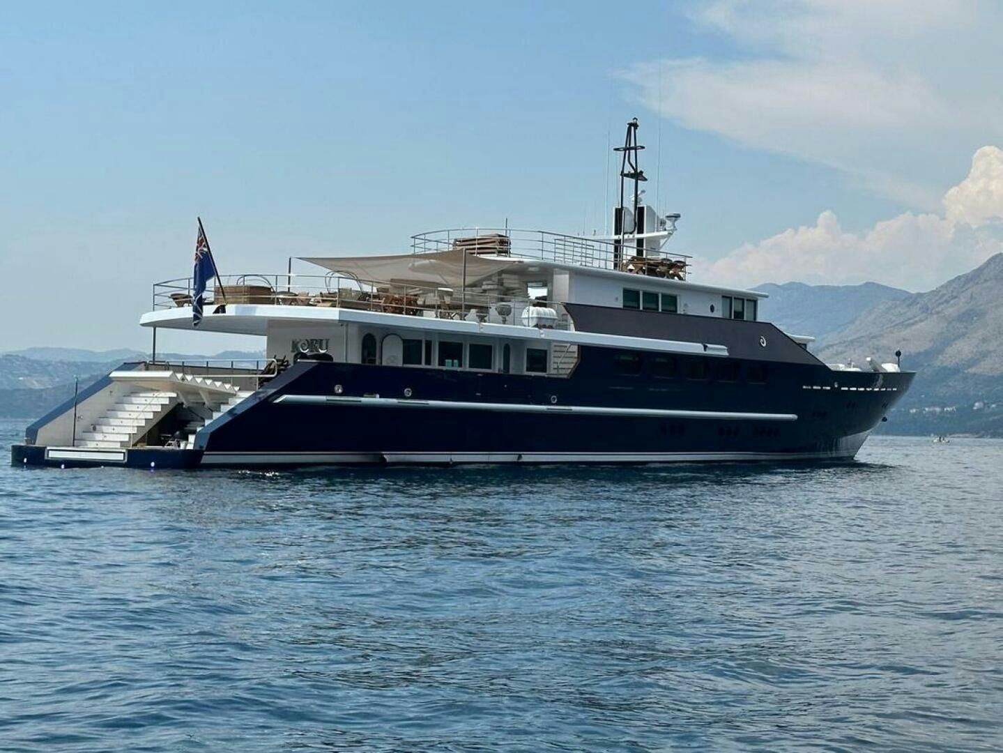 a large boat in the water aboard KORU Yacht for Charter