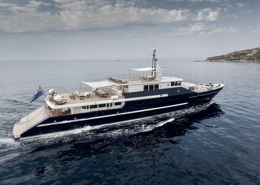 a large white boat in the water aboard KORU Yacht for Charter