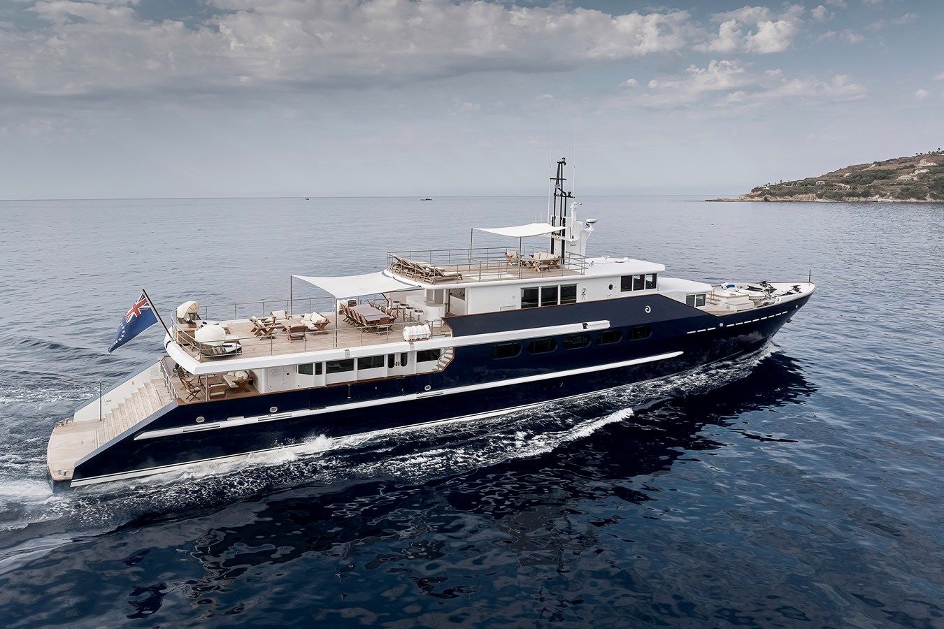a large white boat in the water aboard KORU Yacht for Charter