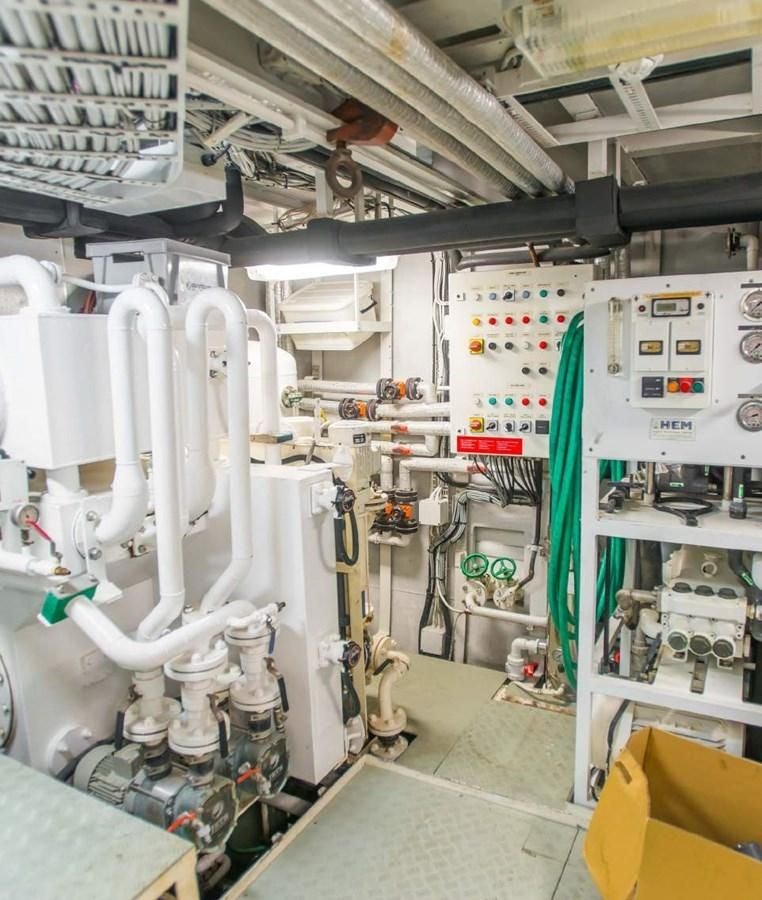 a room with machinery aboard KORU Yacht for Charter