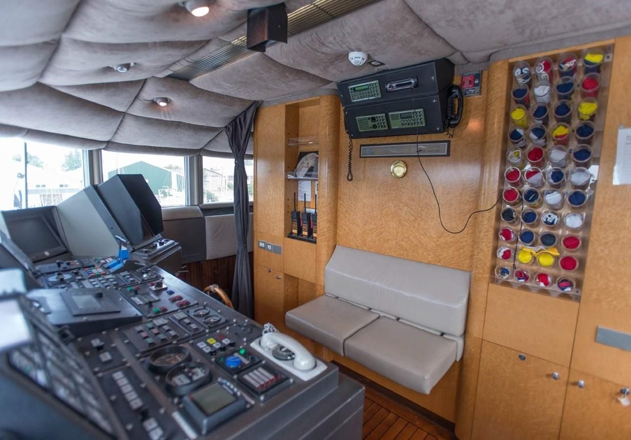 a room with computers and printer aboard KORU Yacht for Charter