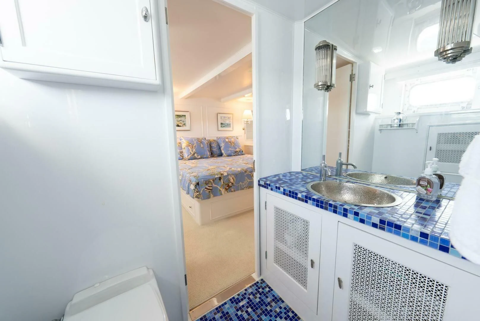 a kitchen with a sink and a microwave aboard BERNADETTE Yacht for Sale