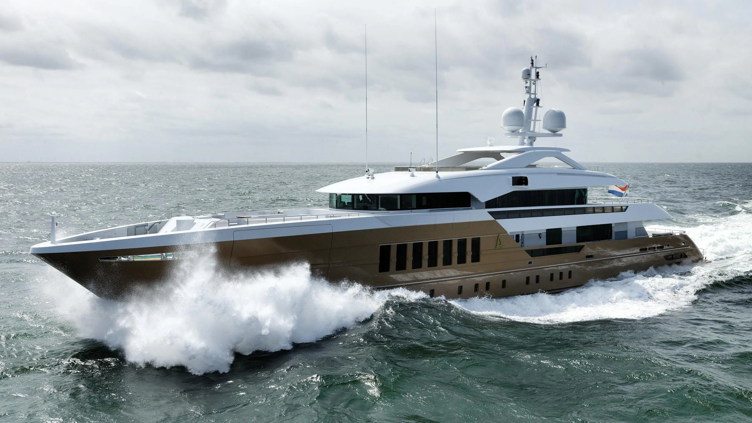 a large white boat on water aboard AZAMANTA Yacht for Sale