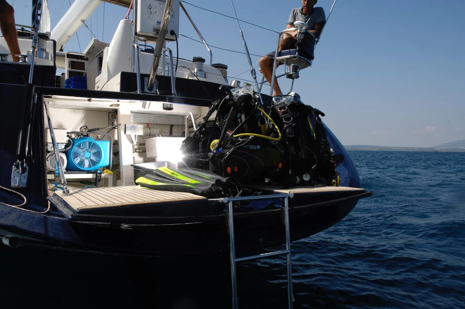 a man on a boat aboard PULSAR II Yacht for Sale