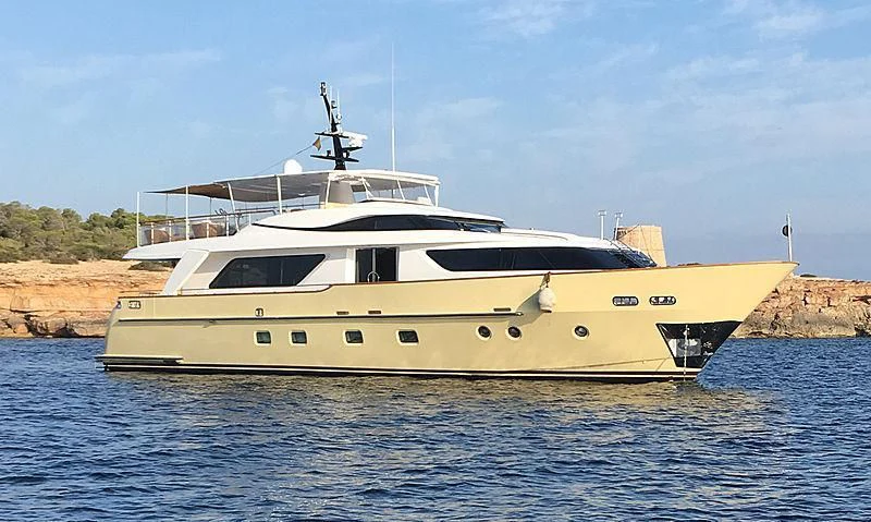a large white boat in the water aboard AKUA Yacht for Sale