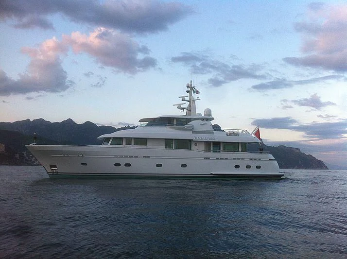 a white boat on water aboard BELLE DE JOUR Yacht for Sale