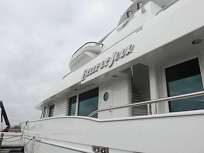 a white building with a sign on it aboard BELLE DE JOUR Yacht for Sale