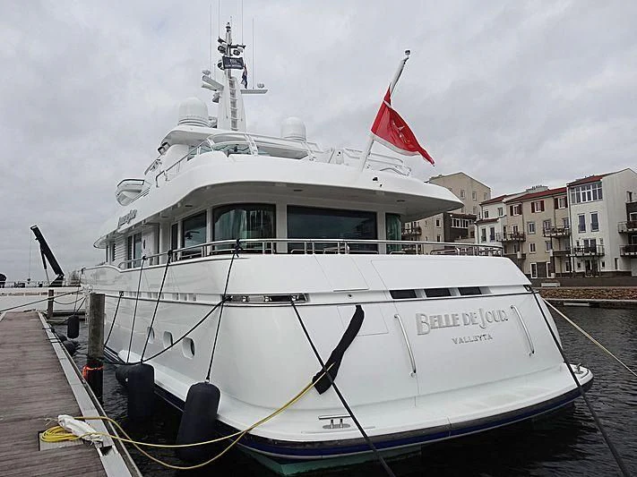 a boat docked at a pier aboard BELLE DE JOUR Yacht for Sale