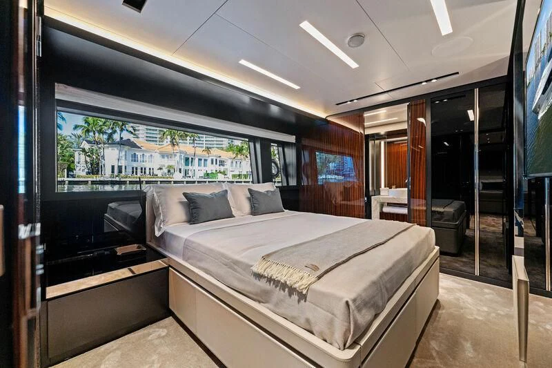 a bed in a room aboard BESO Yacht for Sale