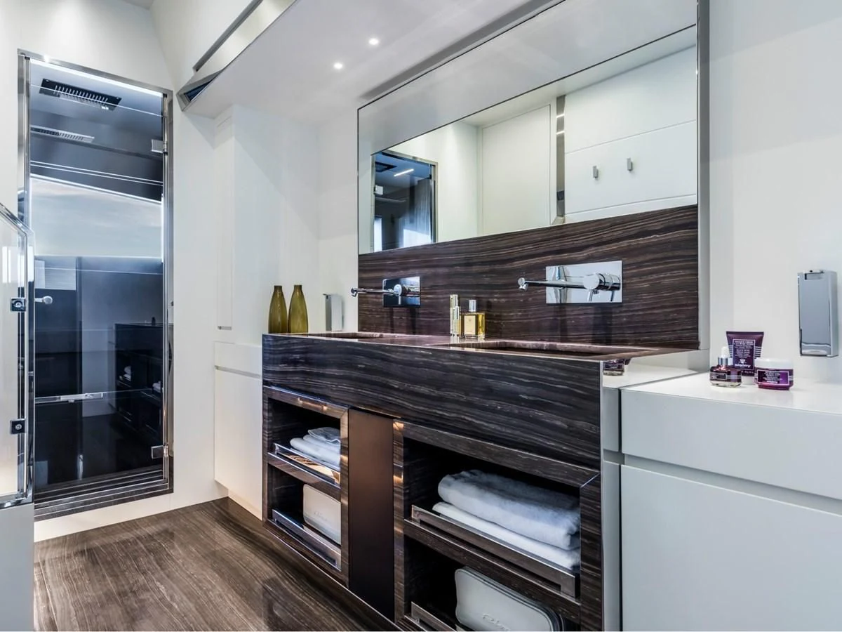 a kitchen with a glass door aboard BESO Yacht for Sale