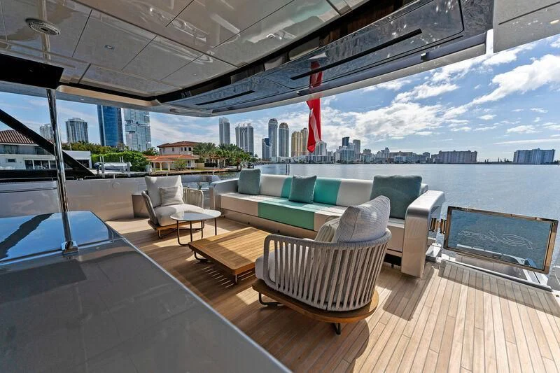 a room with a large window and a view of a city aboard BESO Yacht for Sale