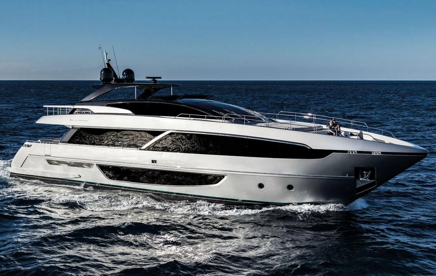 a white yacht in the water aboard BESO Yacht for Sale