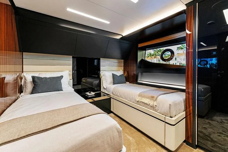 a room with two beds aboard BESO Yacht for Sale