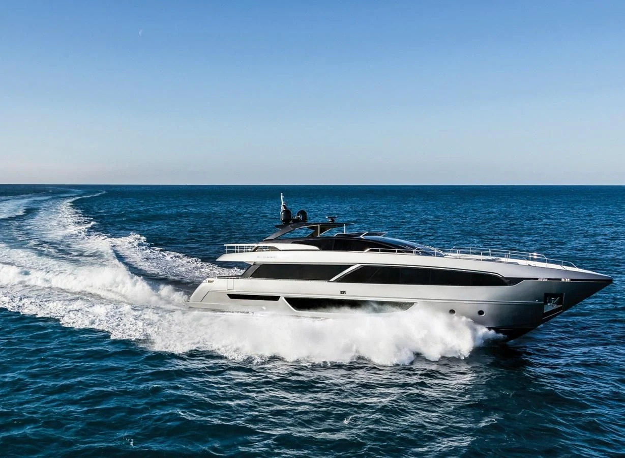a white yacht in the water aboard BESO Yacht for Sale
