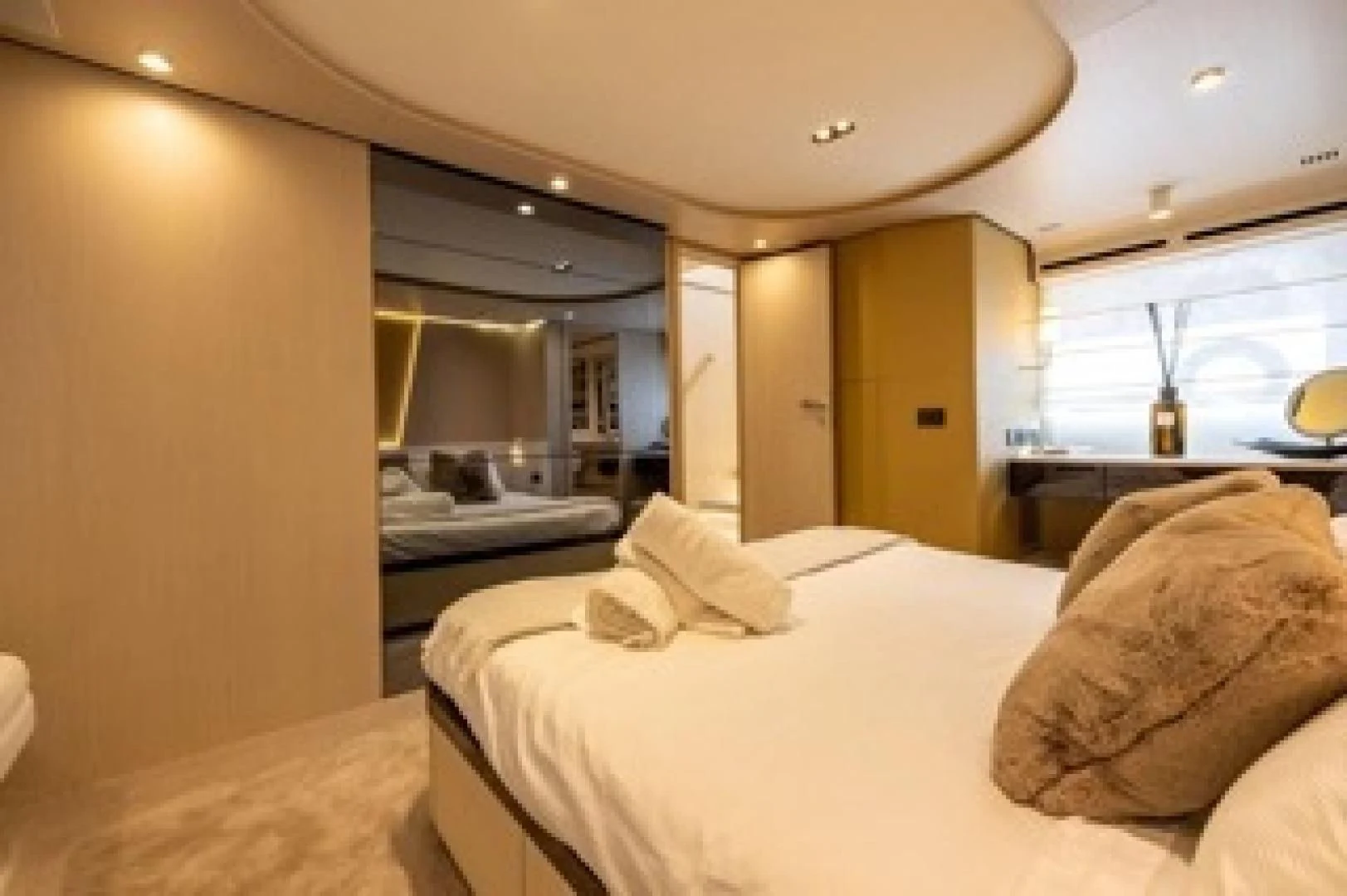 a room with a bed and a window aboard SUN LIFE Yacht for Sale