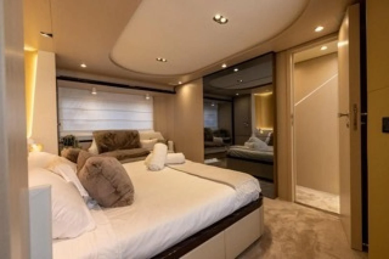 a room with a bed and a couch aboard SUN LIFE Yacht for Sale