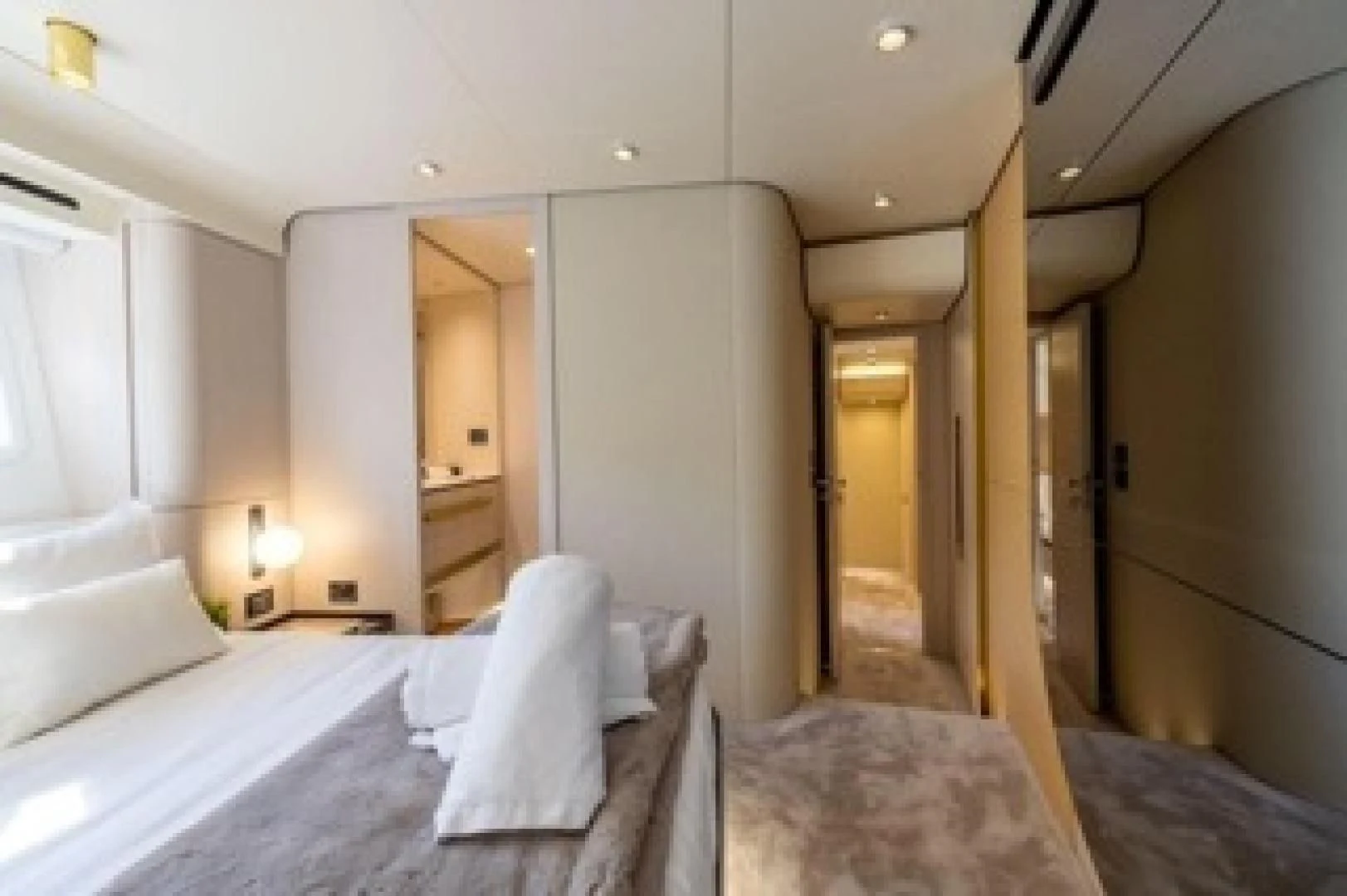a room with a bed and a door aboard SUN LIFE Yacht for Sale