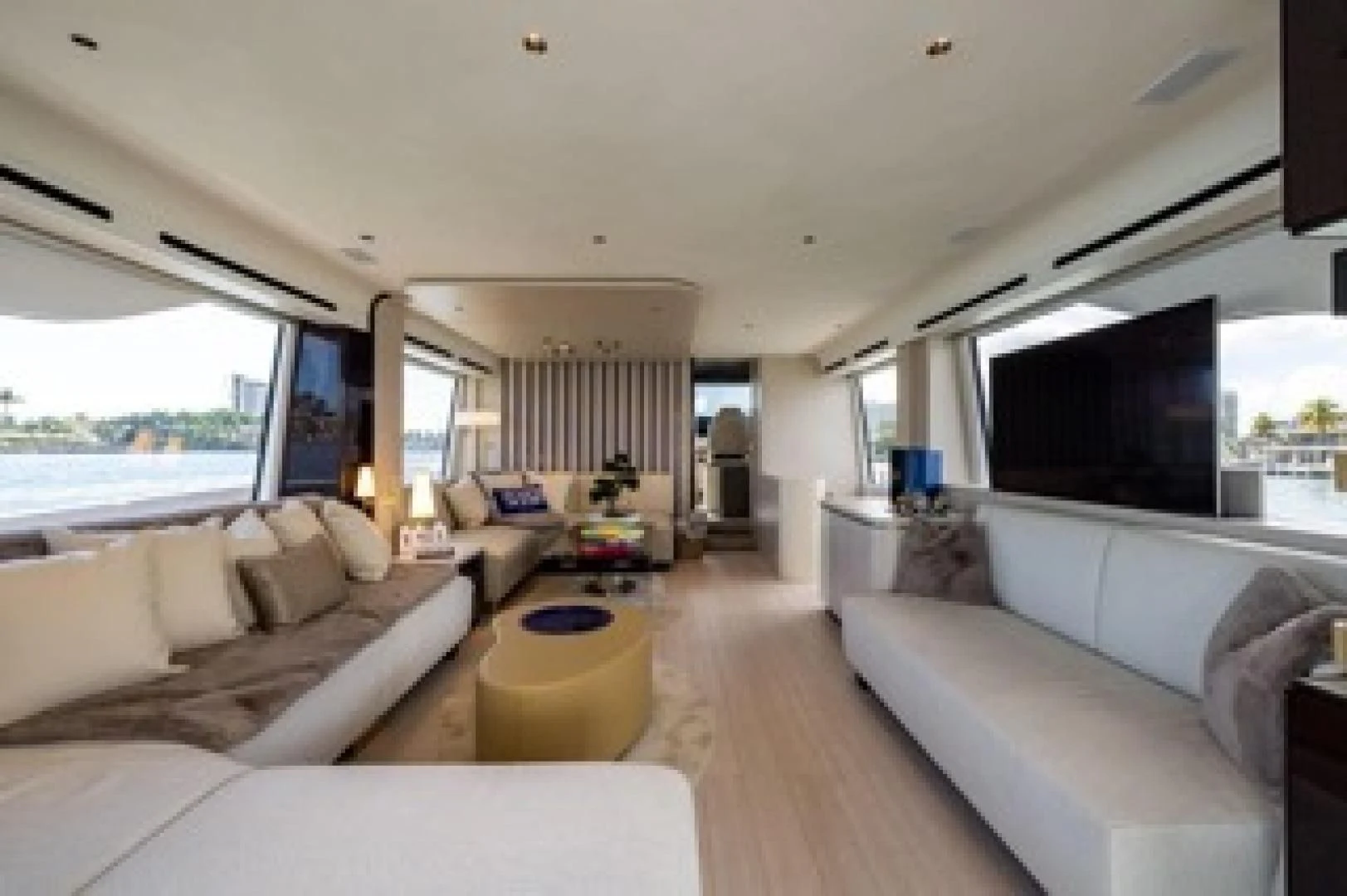 a living room with a large screen aboard SUN LIFE Yacht for Sale
