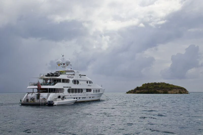 a boat on the water aboard NO COMMENT Yacht for Sale