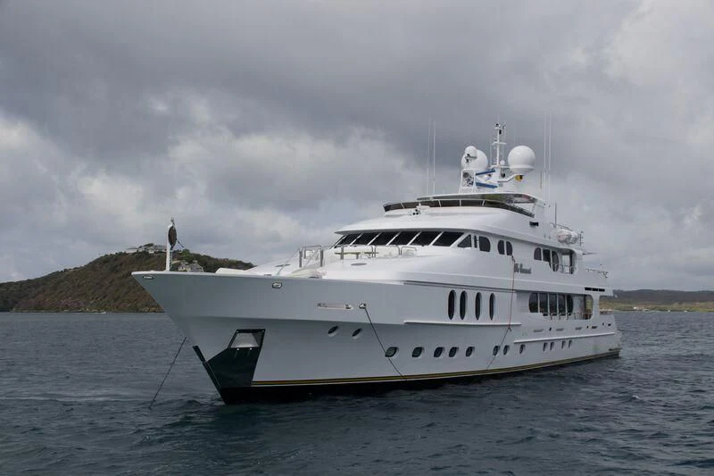 a white boat in the water aboard NO COMMENT Yacht for Sale