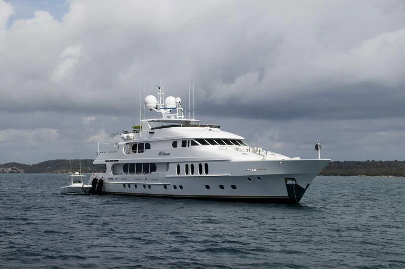 a white yacht in the water aboard NO COMMENT Yacht for Sale